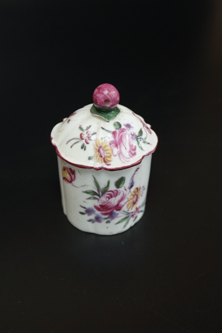 A Mennecy polychrome pomade pot and cover, c.1760, 7.5cm high